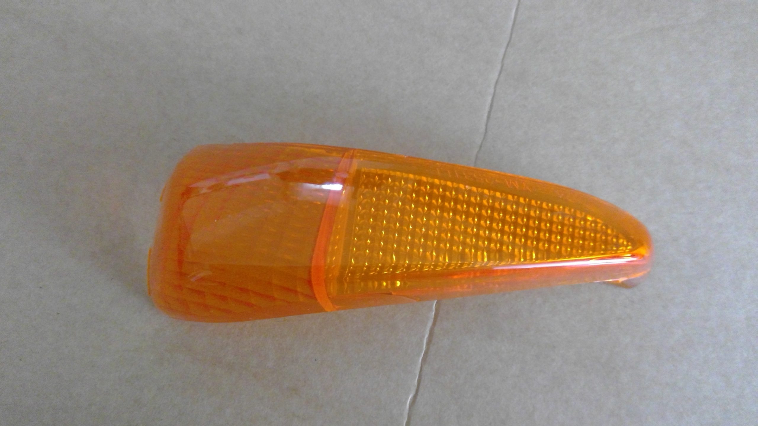 LEFT REAR INDICATOR LENSE 584020NA